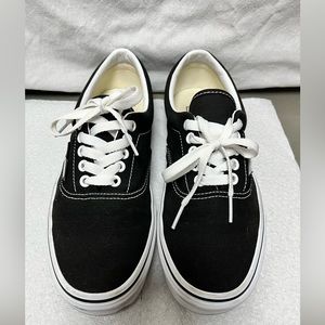 Black and white Vans shoes